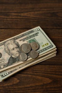 FIRE Principle 3 : Mindful Spending - Some dollar bills 